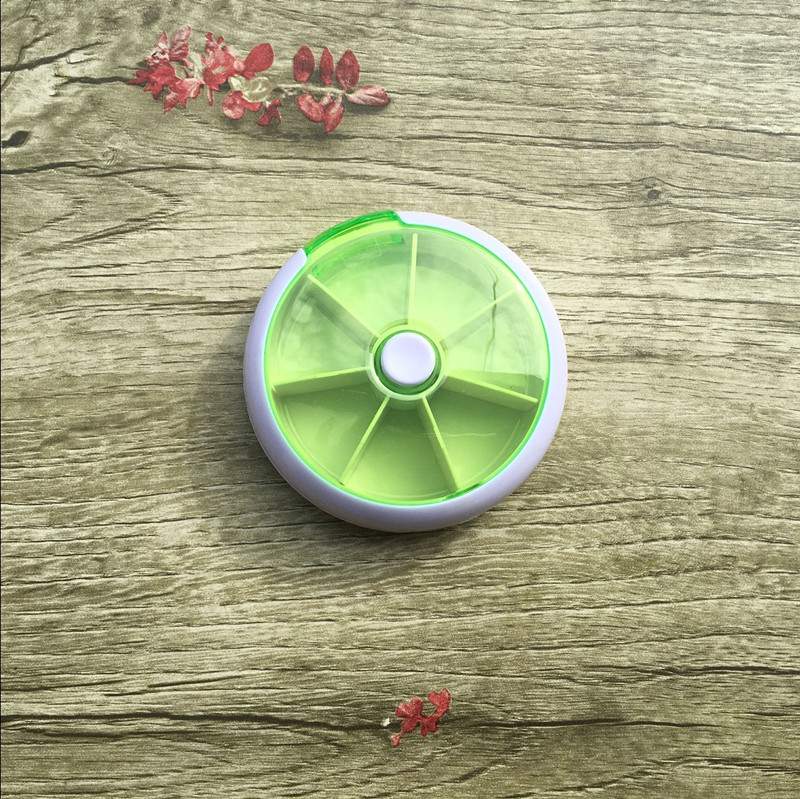 Creative round one week seven grid rotating pill box 7 days portable 7 Grid Week plastic portable small pill box