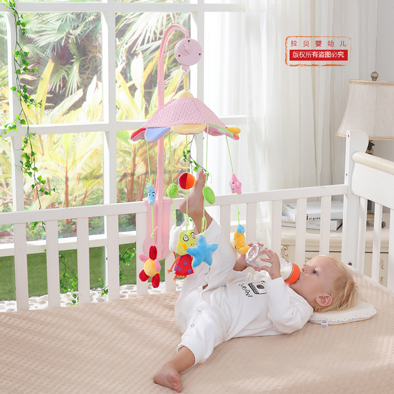 Bebé cama de la rana Campana con caja de música giratoria cama Bell bebé juguete de peluche cama colgante fuente fabricante