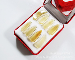 Factory-direct sales of thickened, grooved ox-horn guzheng picks—wholesale! Children's and adult-sized guzheng picks, packaged in an 8-piece box.