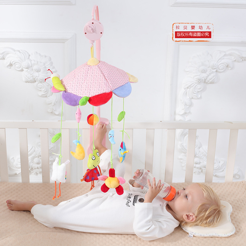 Bebé cama de la rana Campana con caja de música giratoria cama Bell bebé juguete de peluche cama colgante fuente fabricante
