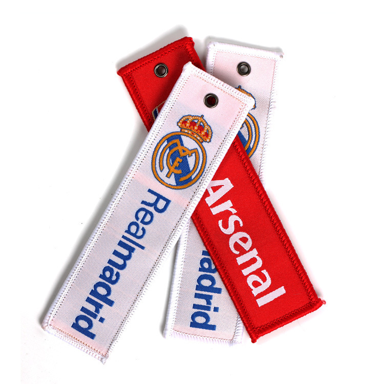 Guangzhou Factory Custom Production and Processing of Oeko-Tex Certified Woven Labels, Eyelet Key Tags, and Custom Woven Labels