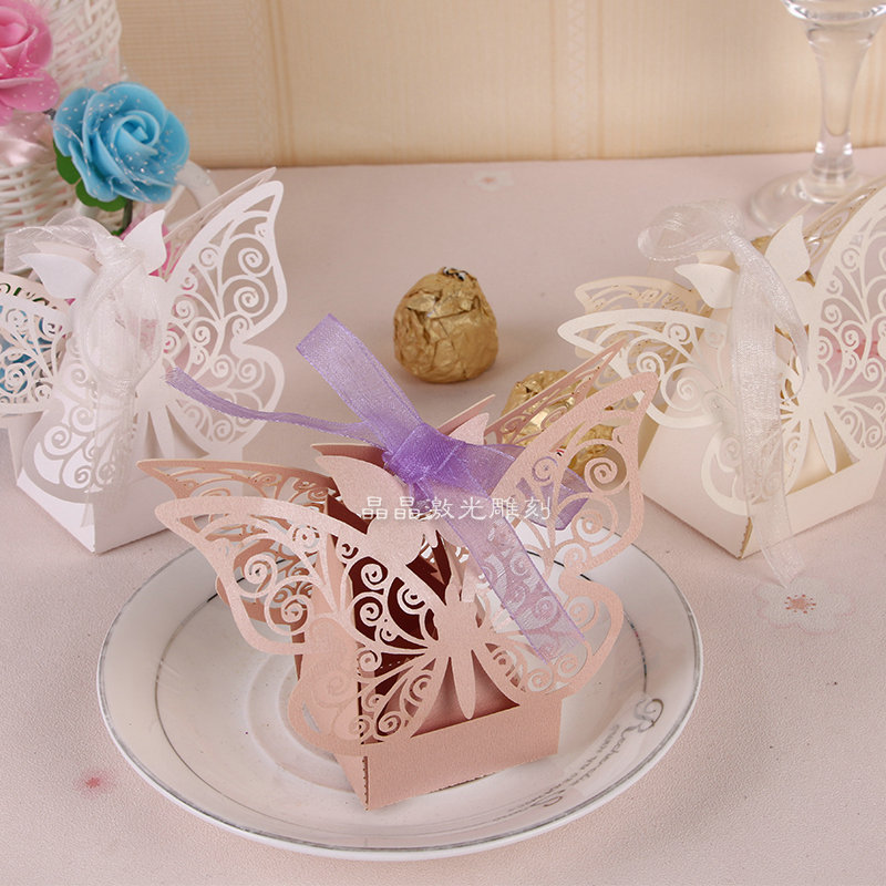 Creative wedding bow candy boxes, holiday gift boxes, wedding hollow ribbon candy boxes wholesale.