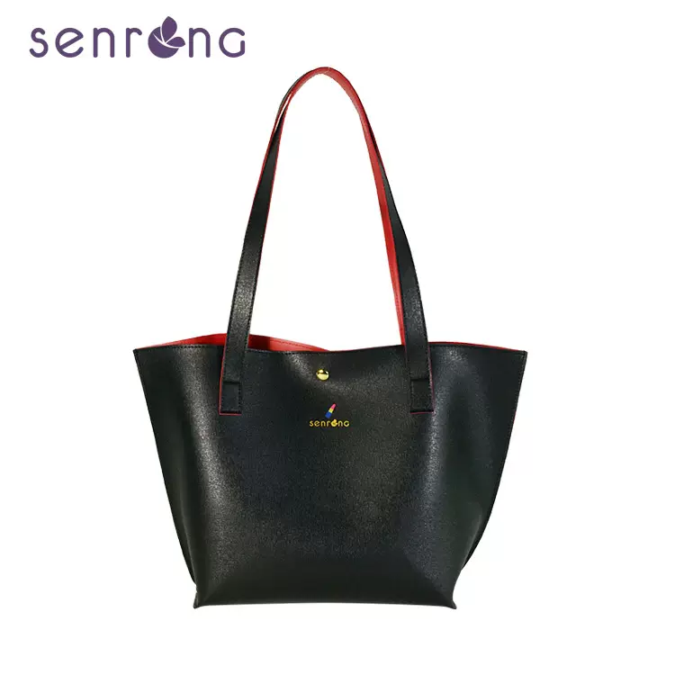 工厂定制新款韩版时尚潮流单肩斜跨包高档水饺型石头纹PU时尚女包