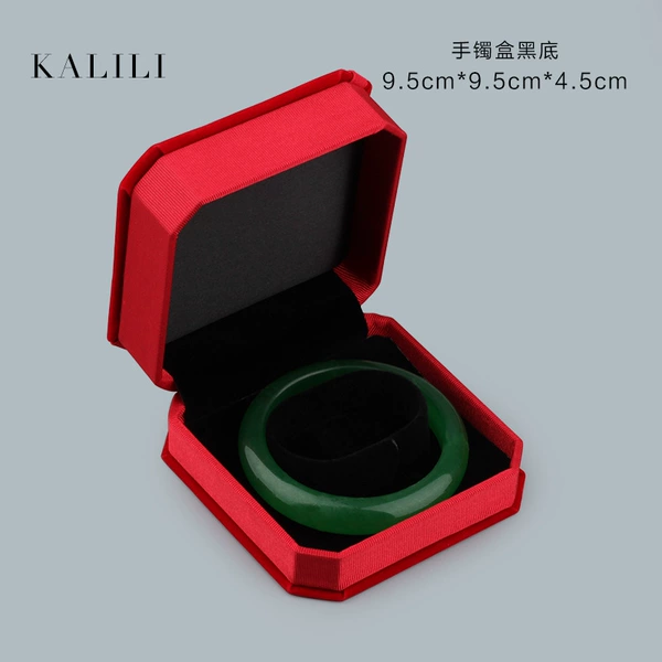 00389 (42 B6-7) Old octagonal bracelet box big red and black background