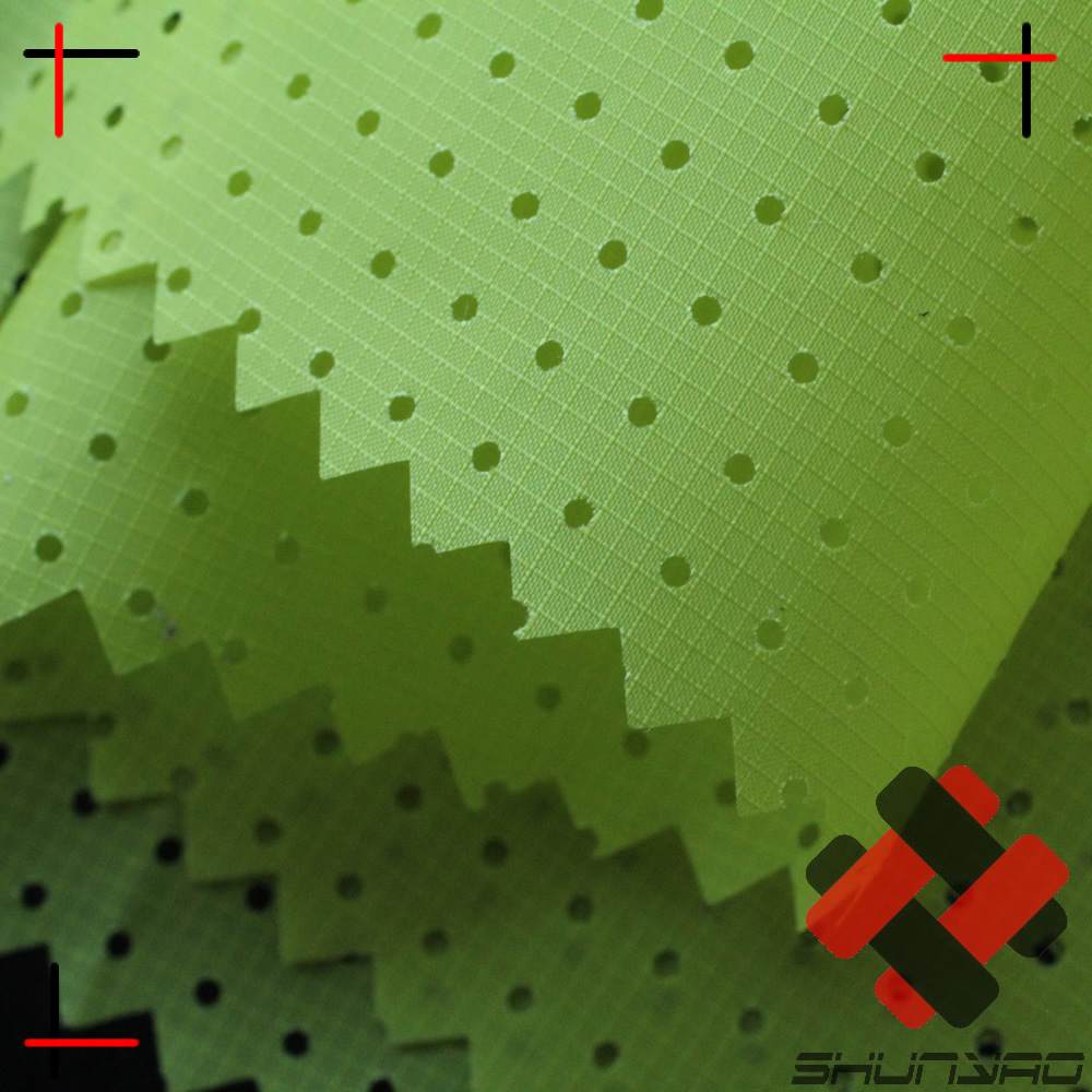 舜尧 20D涤纶格子打孔 运动服透气激光冲孔面料