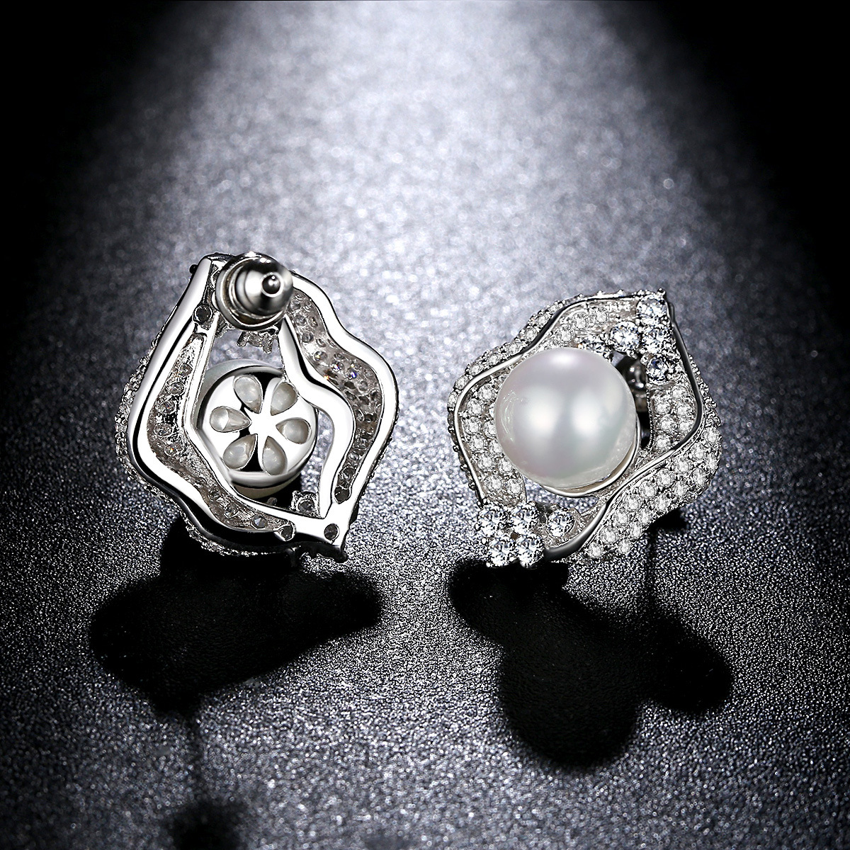 Copper earrings from pearl with zircon