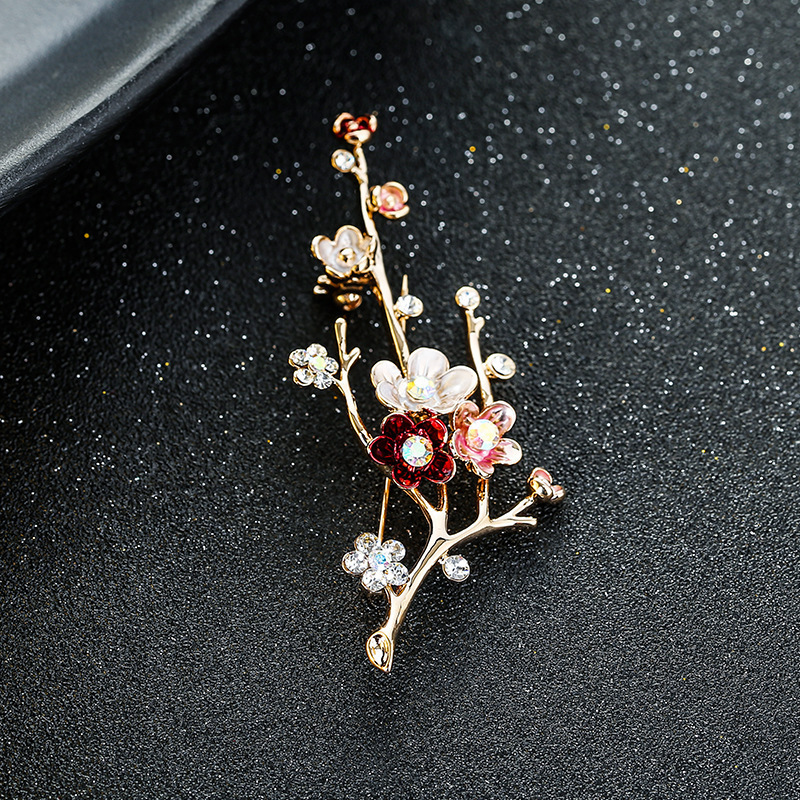 韓国の金色のレトロで優雅な花の胸の花はファッションの合金を組み合わせてダイヤモンドのブローチの女性の服を入れてアクセサリーを配合します。|undefined