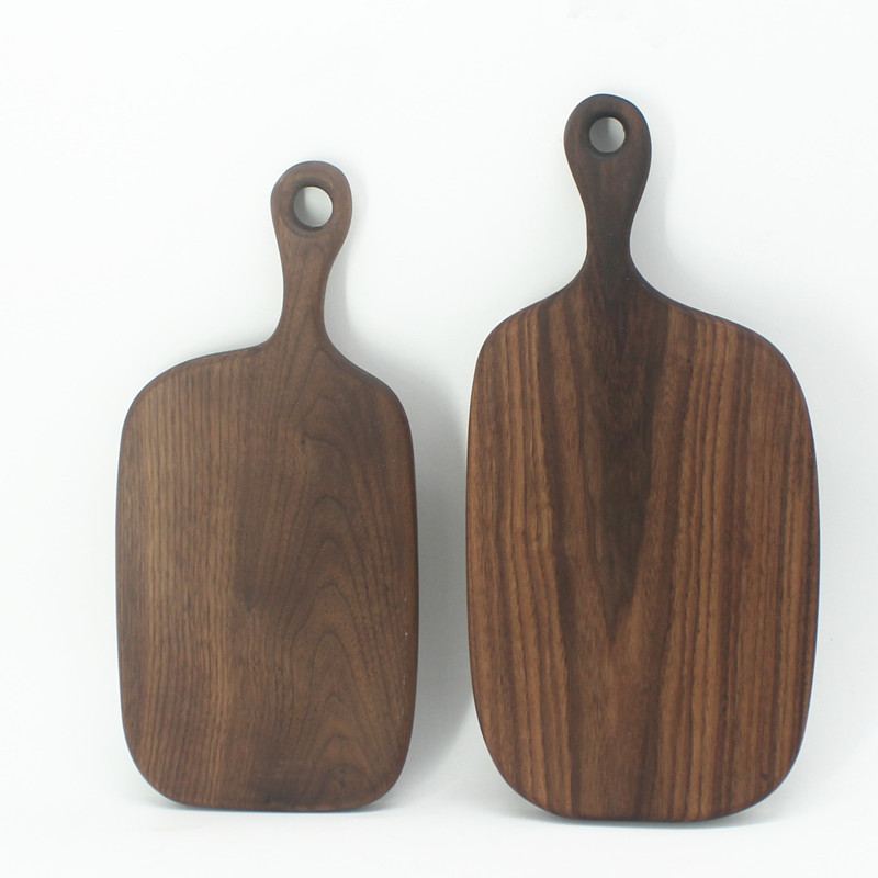 Tablero de pan de madera maciza tabla de cortar de madera de nogal negro tabla de cortar con mango colgando placa occidental multifuncional tabla de cortar de madera