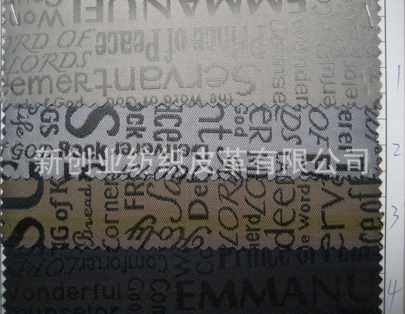 发泡底提花布手袋箱包布涤纶布料包包手袋布料字母提花布料
