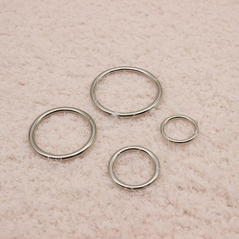 Venta directa de cuero accesorios de hardware círculo sólido O-tipo de hebilla ajustable de aleación de zinc hebilla de cordones de conexión de bricolaje hebilla de plata