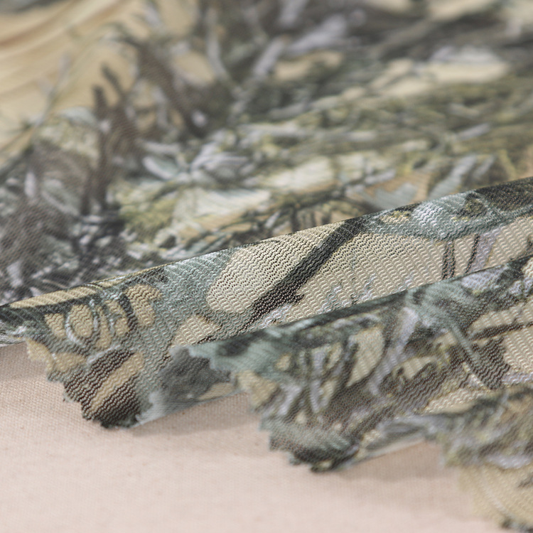 厂家直供现货欧洲大树叶伪装网经编迷彩布面料黑色蟒纹迷彩布批发