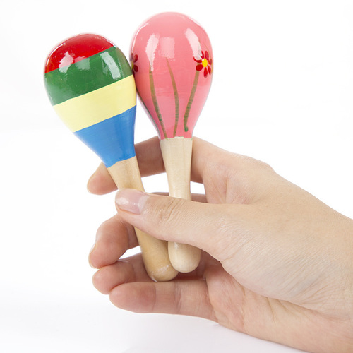 Baby holding educational toy Orff musical instrument wooden cartoon maracas wooden maracas exercise auditory rattle