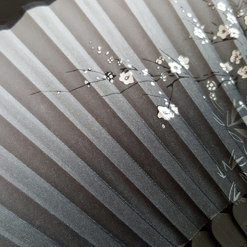 Manufacturer wholesale imitation silk female fan custom silk Chinese style smiling plum Japanese style female fan gift fan customization