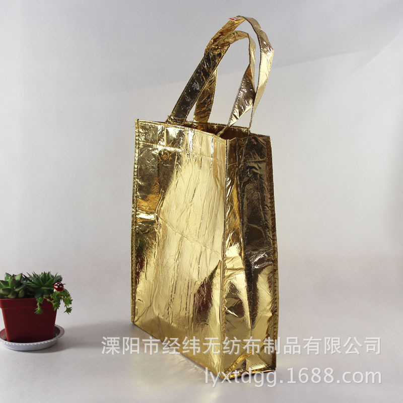 工厂生产直供金色镭射无纺布覆膜袋 压纹镭射环保购物袋 加印LOGO