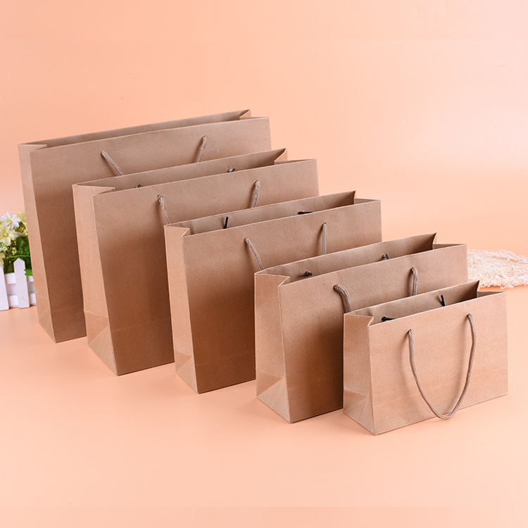 厂家定 做韩国服装袋 创意礼品牛皮纸袋 童装店手提袋logo定 制