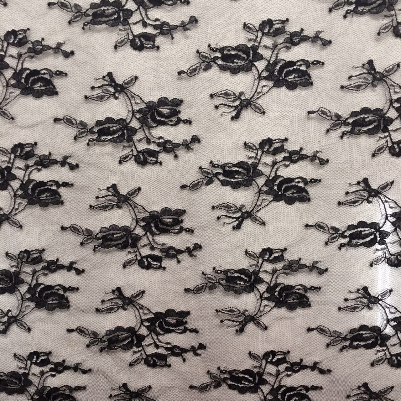 厂家直供 无弹锦纶提花网布布料 花朵打底衫童装裙子面料批发现货