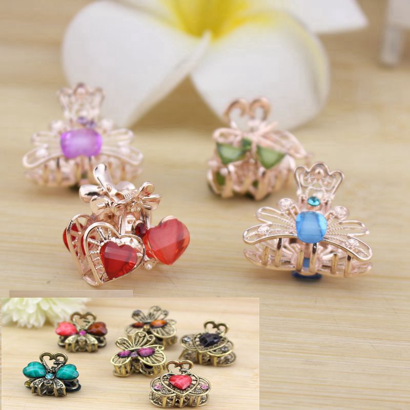 Golden claw manufacturers wholesale jewelry Korean version of Rhinestone Cat's Eye grip alloy small grip mixed batch