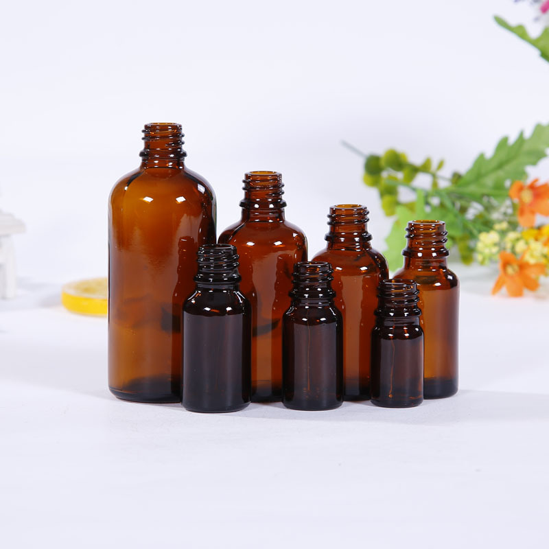 Suministre la botella de aceite esencial de 5ml 100mL Brown en la botella de empaquetado cosmética del aceite esencial de la botella de aceite esencial de la acción
