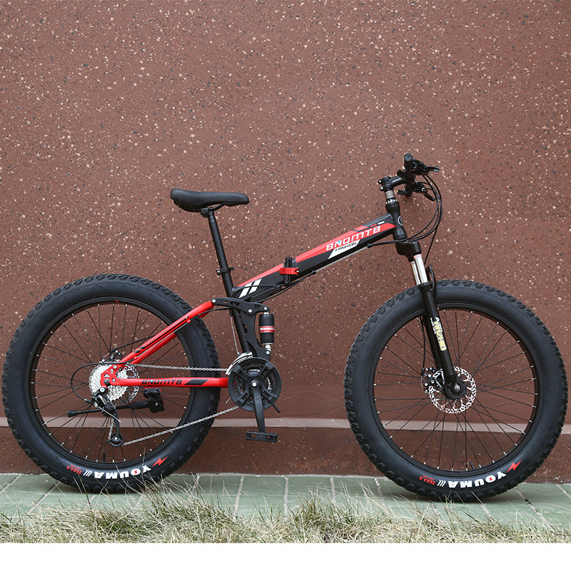 Fábrica al por mayor plegable nieve bicicleta de montaña de velocidad variable amortiguador freno de disco ensanchado neumático grande bicicleta de regalo