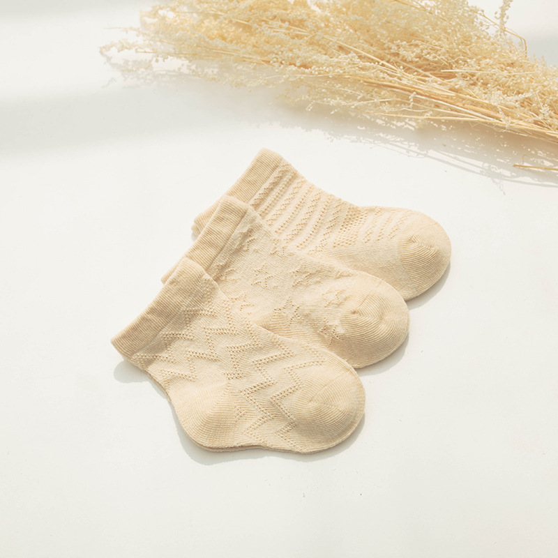 Primavera y verano nuevos calcetines de bebé de algodón de color recién nacido 0-1 años 0-3 años de edad bebé malla deshuesada calcetines delgados para niños