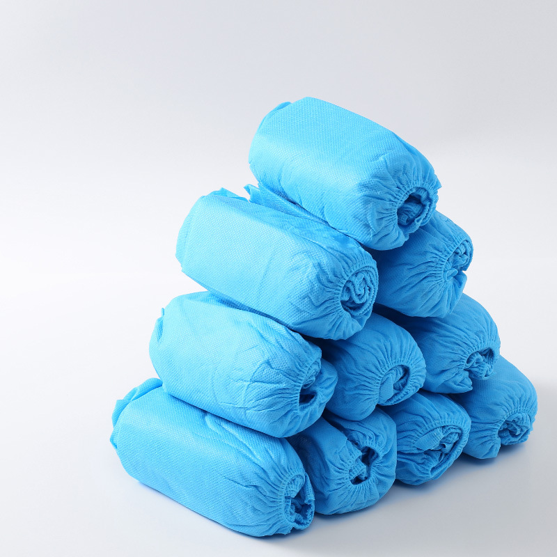 Qihong antideslizante negro cubierta del zapato desechable engrosada no tejida cubierta del pie transpirable blanco hogar cubierta del zapato