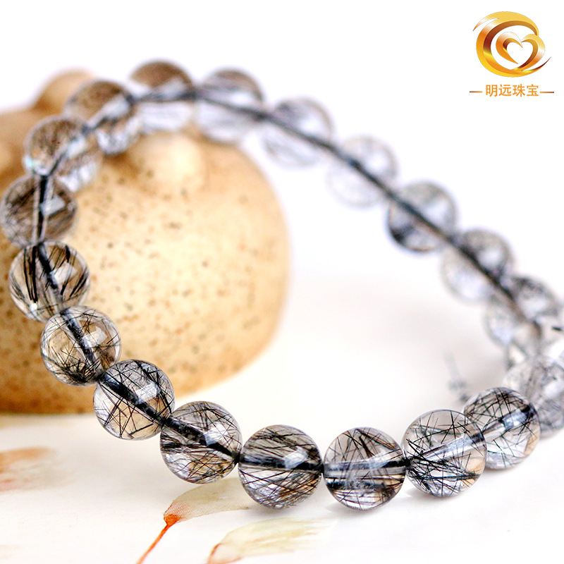 El pelo negro natural de la pulsera cristalina al por mayor del pelo negro de la pulsera cristalina del pelo bueno menos pelo 5A más 3A dos clases de cristal negro del pelo