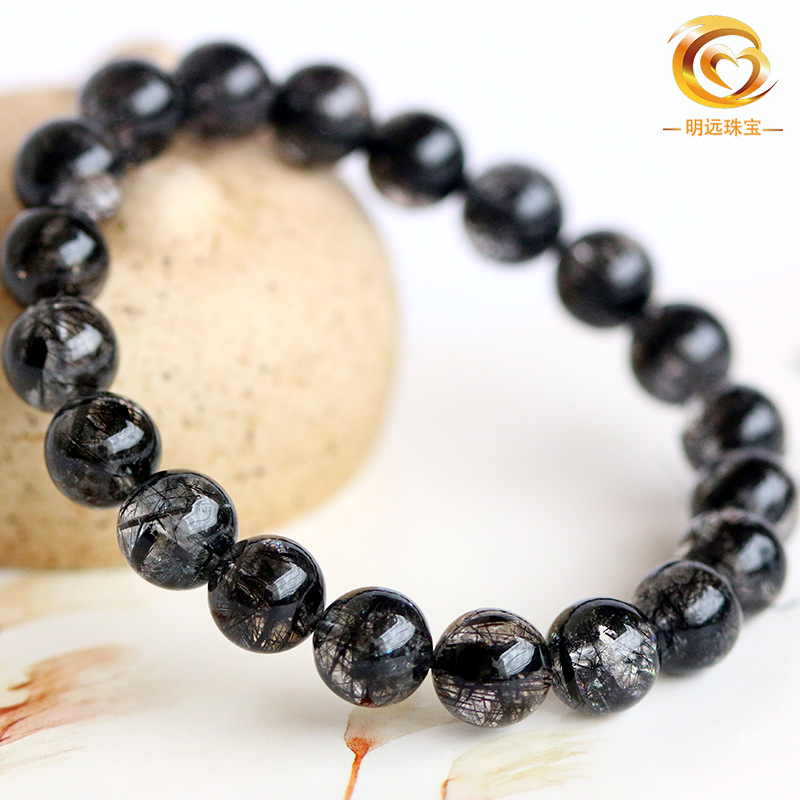 El pelo negro natural de la pulsera cristalina al por mayor del pelo negro de la pulsera cristalina del pelo bueno menos pelo 5A más 3A dos clases de cristal negro del pelo