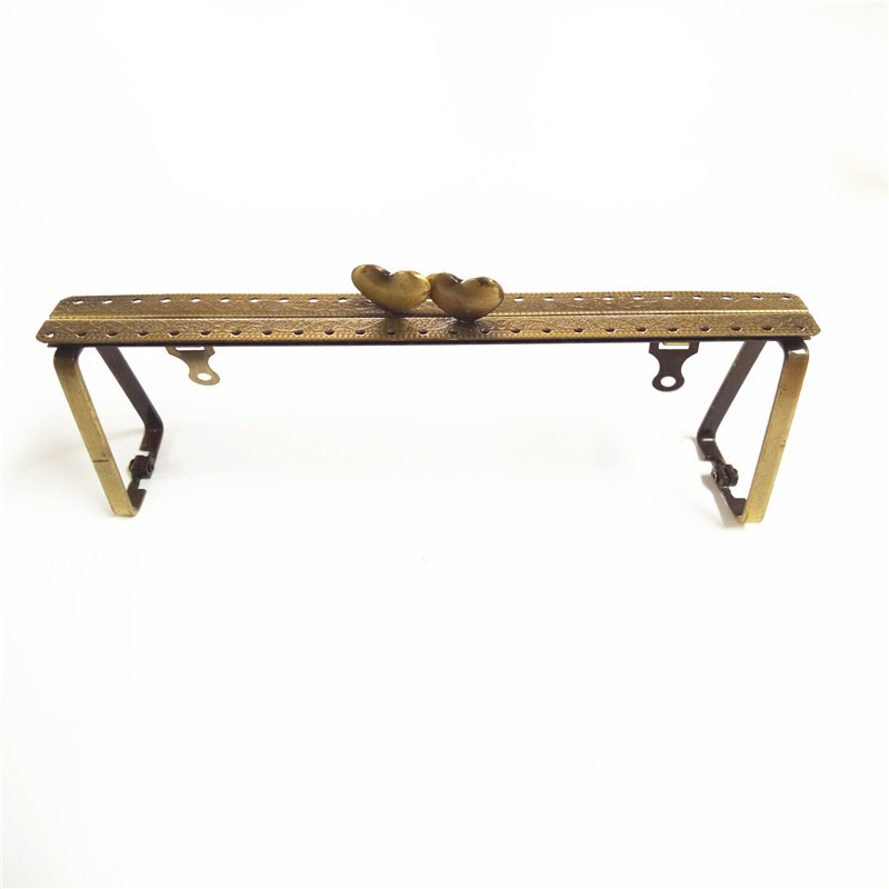 厂家批发  针孔压花心形头 手缝包口金制作  手袋夹