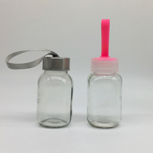 供应150ml牛奶瓶饮料瓶果汁瓶透明玻璃瓶带提绳盖子