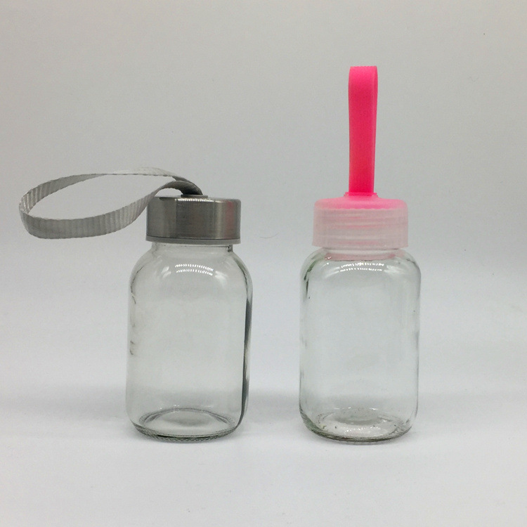 供应150ml牛奶瓶饮料瓶果汁瓶透明玻璃瓶带提绳盖子