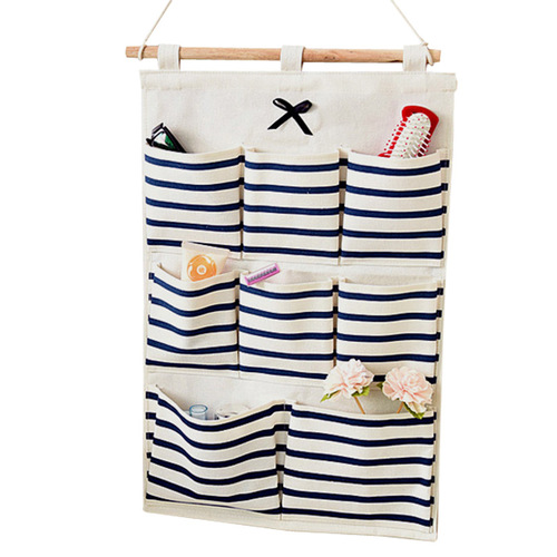Korean-style minimalist fabric cotton and linen hanging bag, waterproof PE membrane-covered multi-layer storage hanger for the back of the door, wholesale