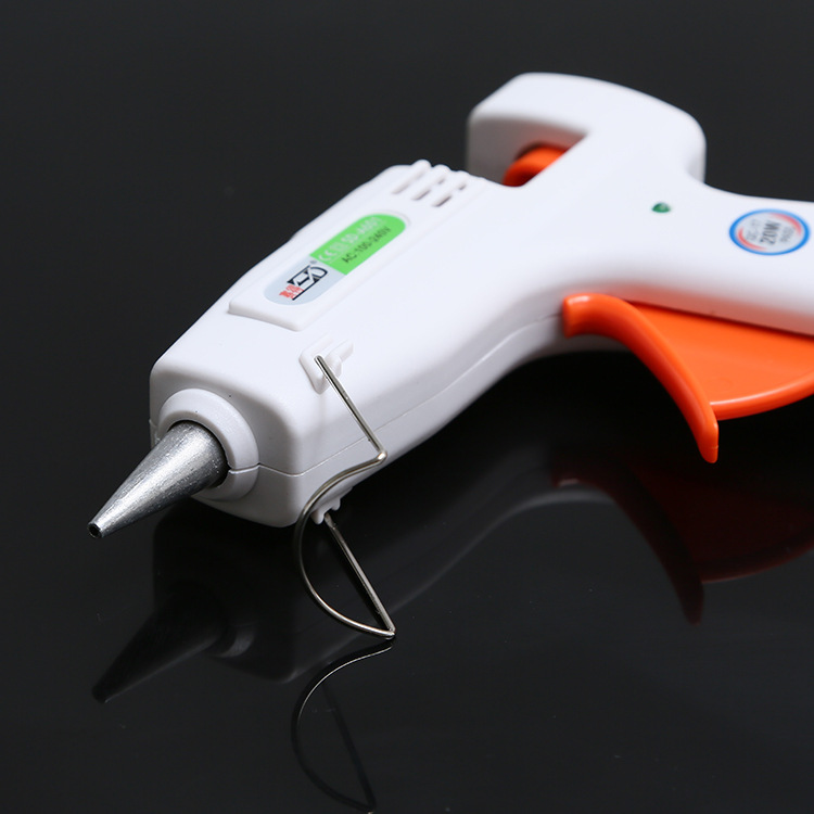 Milán nuevo material de embalaje de flores pistola de pegamento de fusión en caliente palo de pegamento ramo de embalaje pistola de pegamento eléctrica al por mayor 100