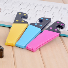 Creative V-type phone lazy folding stand, suitable for mobile phones, tablets, iPads, desktop stands, wholesale