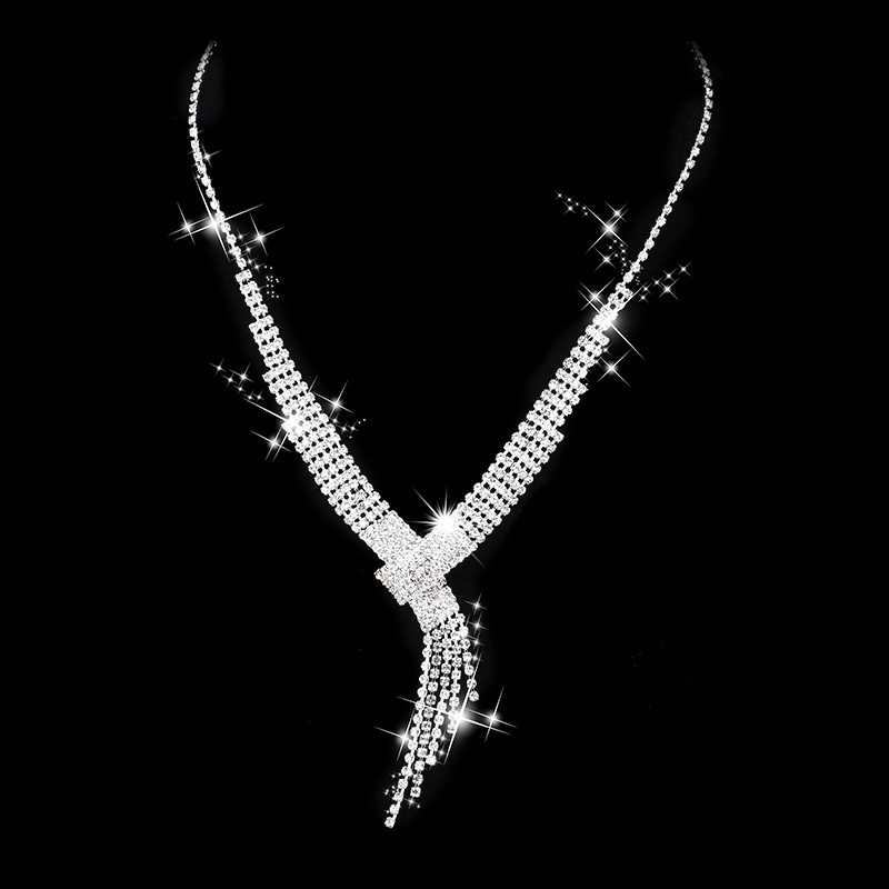 Traje de joyería al por mayor moda ol garra cadena pendientes borla collar pendientes traje joyería de la boda