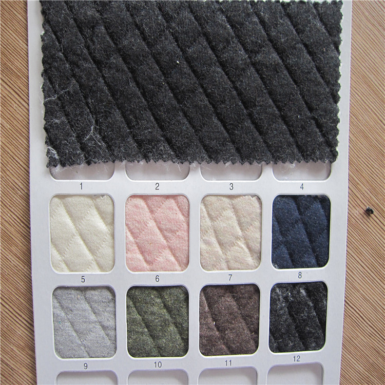 供应针织面料 提花布 菱型空气层格子布 服装家纺面料