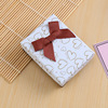 White small gift box, rectangular red storage system with bow