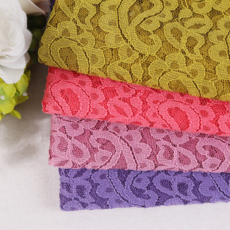 涤氨立体腰果花花边演出服布料  浅紫色非洲硬手感蕾丝面料工厂