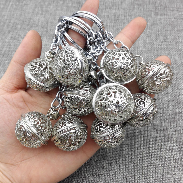 Llavero de campana de oro y plata A1333, colgante de llavero para tienda de 2 yuanes de Yiwu, venta al por mayor