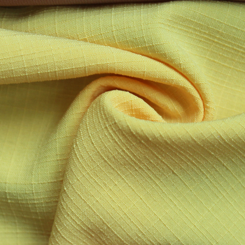 Polyester 100D random grid four-sided elastic polyester ammonia four-sided elastic soft shell fabric outdoor leisure sports quick-drying pants fabric