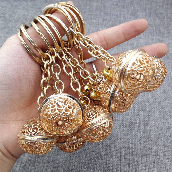 Llavero de campana de oro y plata A1333, colgante de llavero para tienda de 2 yuanes de Yiwu, venta al por mayor