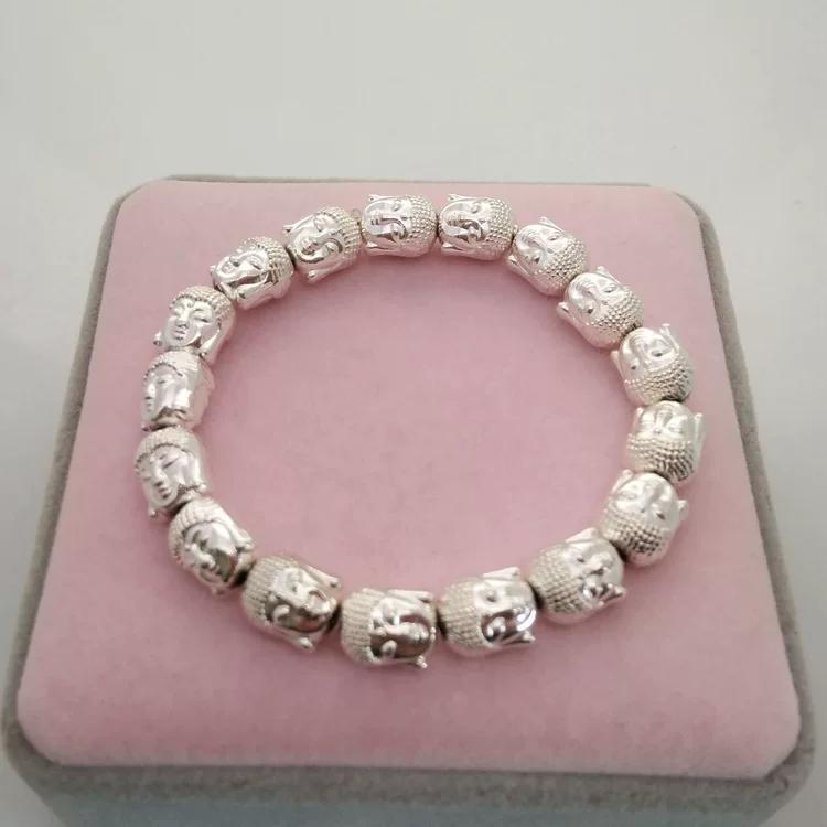 Bracelet Maitreya double-sided Buddha head, 19 cm diameter, ~48 g, silver-white beads