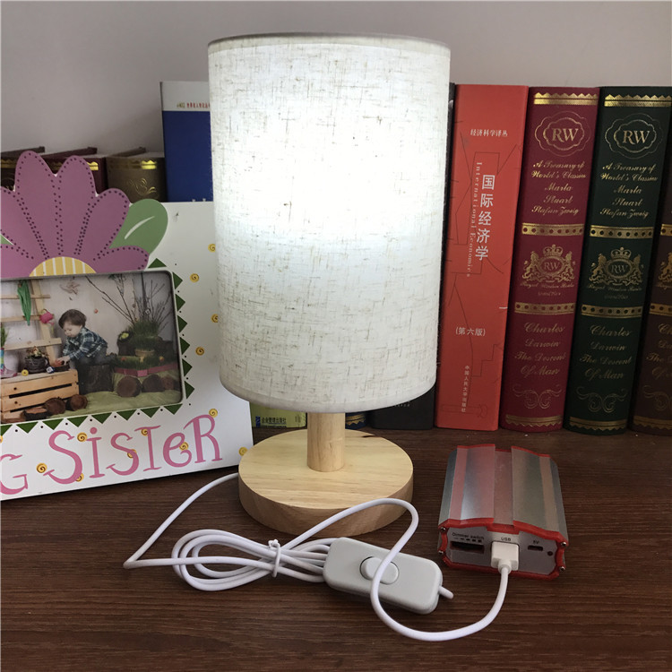 Rejilla Lino tela lámpara de mesa LED base de madera maciza lámpara de mesa USB pequeña lámpara de mesa exportación AliExpress suministro