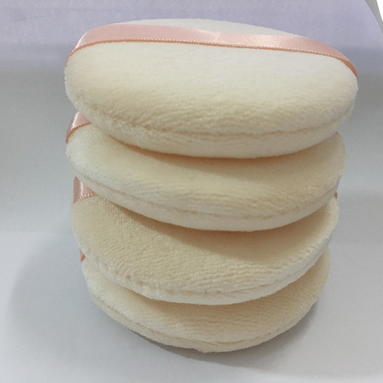 メーカー直売の肌の色の純綿のパフの乾燥した粉の爽やかな粉は手のリボンのパフの蜜の粉を切って化粧の道具をかきます。|undefined