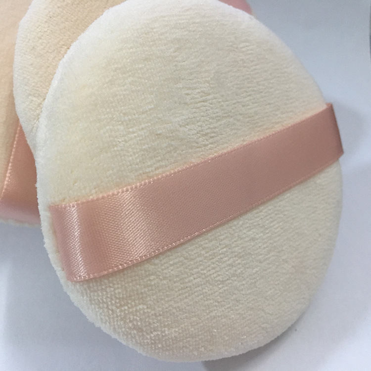 メーカー直売の肌の色の純綿のパフの乾燥した粉の爽やかな粉は手のリボンのパフの蜜の粉を切って化粧の道具をかきます。|undefined