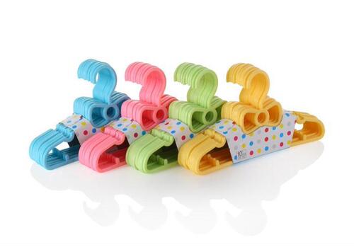 Plastic bow children's clothes hanger, 0-4 year old baby clothes hanger, baby and children's clothing support solid clothes hanger wholesale