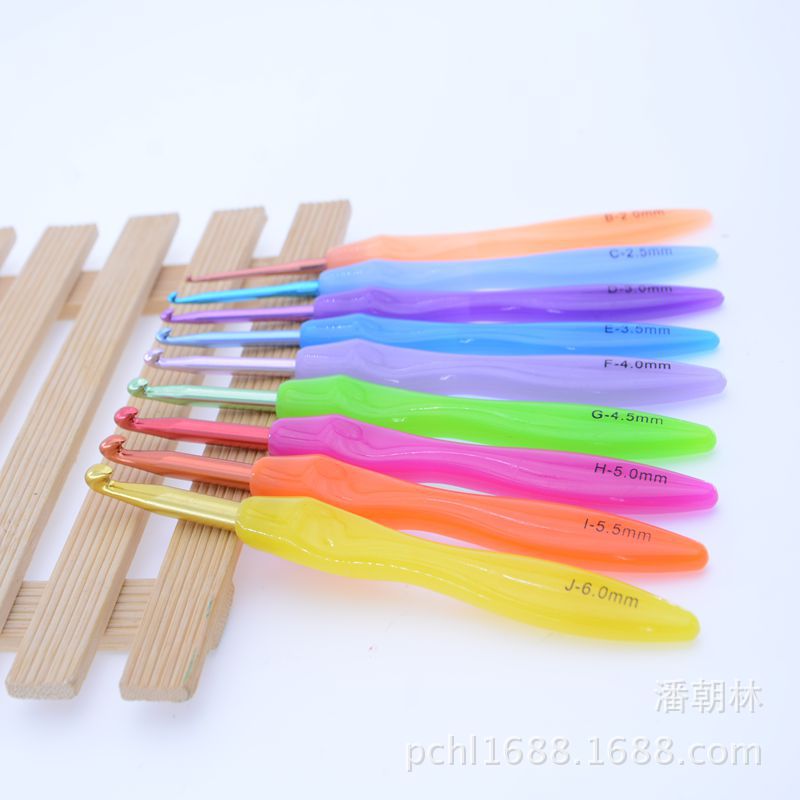 Herramientas de ganchillo ABS Arco Iris plástico mango alúmina ganchillo un conjunto de 9 bolsas