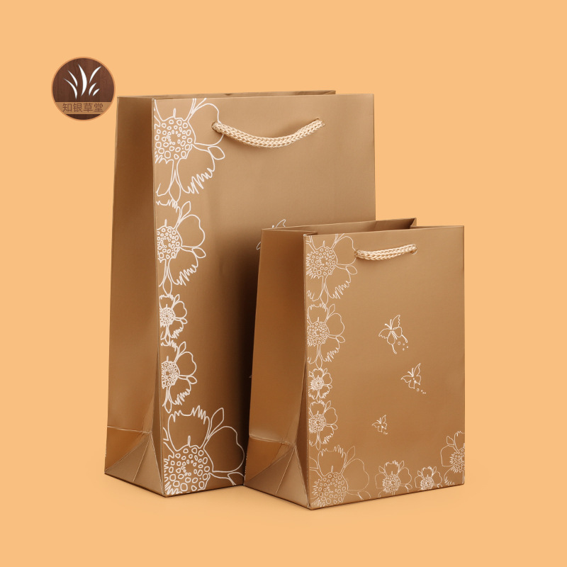 咖色光纸袋花蝴蝶手提袋服装袋 包装袋 时尚 礼品纸袋