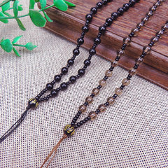 Obsidian- and Onyx-Inspired Round Bead Long-Style Necklace with Eight Guardian Gods Design, Complete with Adjustable Cord, Pendant Accessory, and Sweater Chain Strap
