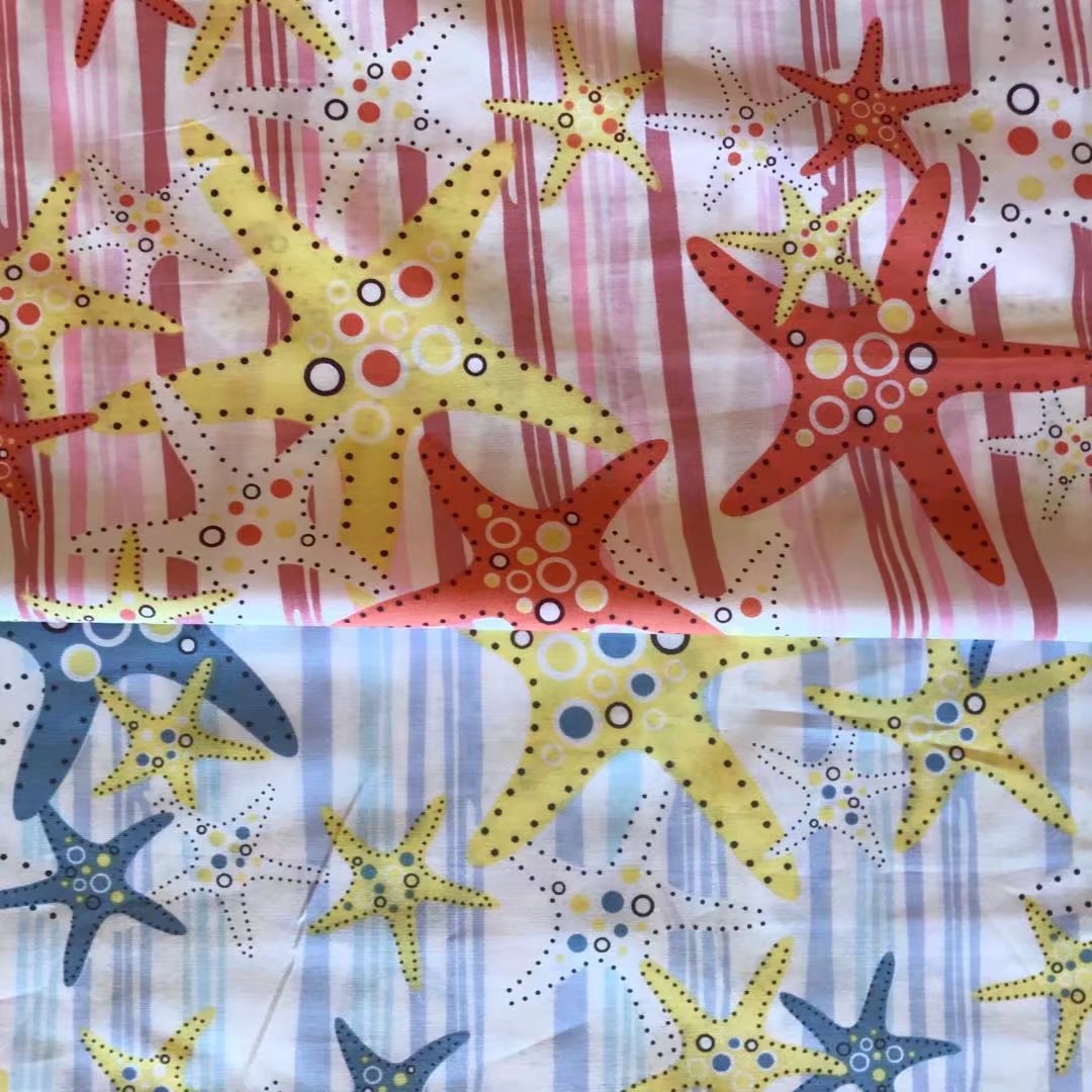 棉活性印花面料 海洋之星海星图案服装面料厂家直销