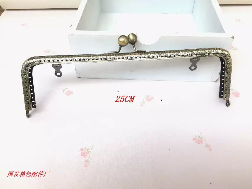 Sin stock: 25CM cuadrado emblema cabeza de bola de oro orejas de bronce bisagras de bolso bisagras